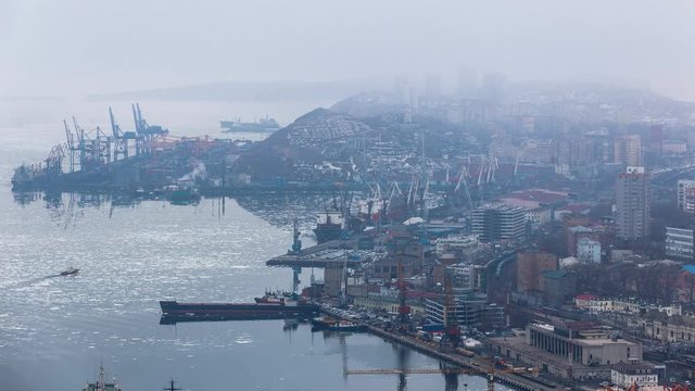 Egersheld, the city center of Vladivostok with a sea trading port, fog in Vladivostok