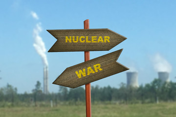 Nuclear War sign on factory plant background