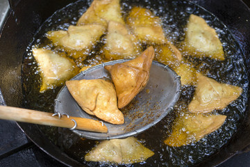 Vegetarian fried samosa, traditional Indian food, street food in Bali, Indonesia