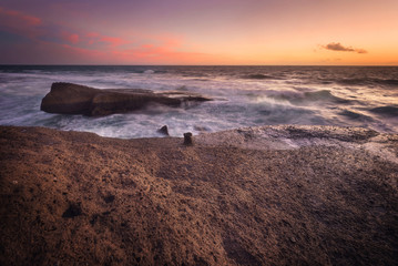 Fine art landscape of la Caleta coastline at sunset in Tenerife, Canary islands, Spain.