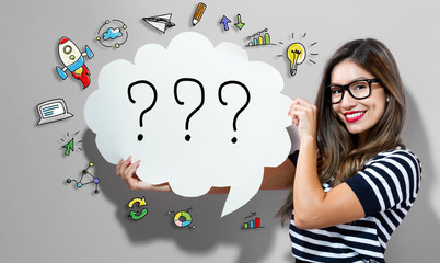 Question Marks text with young woman holding a speech bubble
