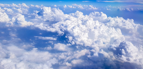 Cumulonimbus cloud above sky view from airplane