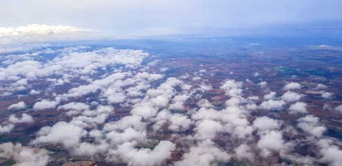 Stratus cloud aboce ground view from airplane