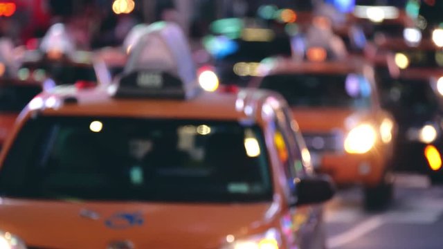 View of traffic in New York on a busy street with burred out look.