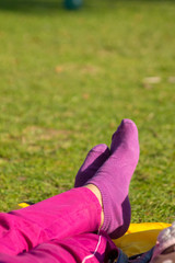 Fototapeta na wymiar Feet relaxed in the grass