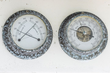 Ship's barometer and thermometer corroded by sea salt