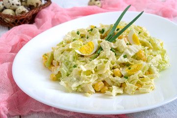 Light spring dietary salad from Chinese cabbage, cheese, quail eggs, corn. Proper nutrition.