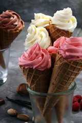 Vanilla frozen yogurt or soft ice cream in waffle cone