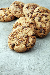 Chocolate cookies on grey table. Chocolate chip cookies shot