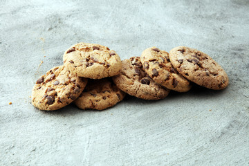 Chocolate cookies on grey table. Chocolate chip cookies shot