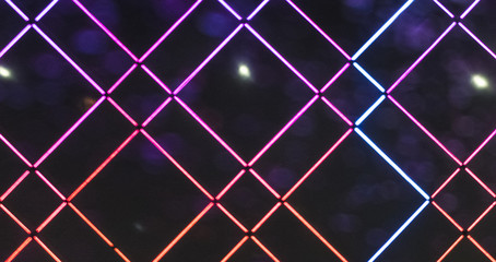 Abstract color neon or led lights background with bokeh effect