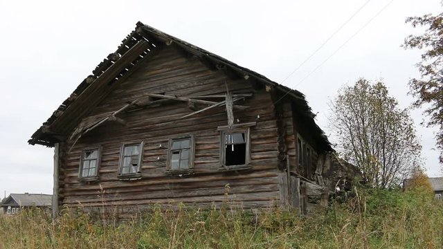 Old culture of wooden houses goes back in time. Russian Northern log hut (Houses of Veps) abandoned by its owners and destroyed
