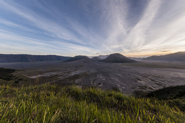 Mount Bromo mountain covered with flowing mist which is a active volcano in the evening, Indonesia