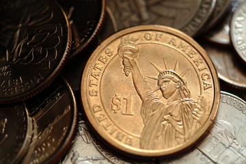 Close up of US one dollar coin © monkylabz