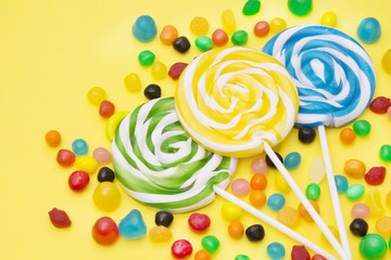 lollipops and candies on colorful backgrounds