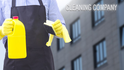 man with cleaning and disinfection products. concept of cleaning company