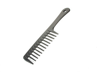 Black plastic comb isolated on the white