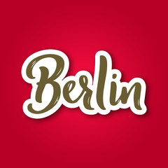 Berlin - hand drawn lettering phrase. Sticker with lettering in paper cut style. Vector illustration.