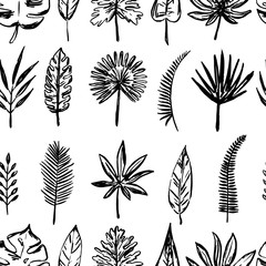 pattern of tropical leaves and flowers.