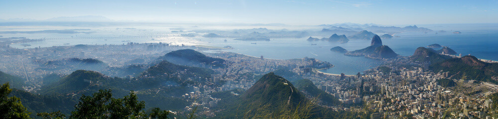 Views to the Rio harbor and Sugar Loaf Mountain from Corcovado in Rio de Janeiro, Brazil.