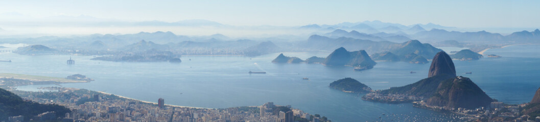 Views to the Rio harbor and Sugar Loaf Mountain from Corcovado in Rio de Janeiro, Brazil.