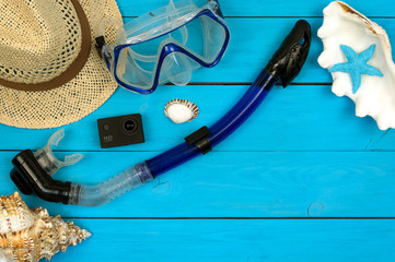 Top view of beach summer accessories with copy space. Traveler accessories. Summer background. Summer beach vacation concept. Flat lay, top view.