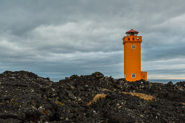Saxholsbjarg orange lighthouse in morning, clouds, Snaefellsnes, Iceland