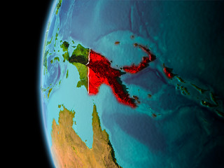 Papua New Guinea from space in evening