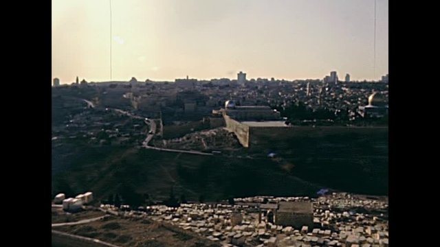 Old City of Jerusalem aerial view. With the Dome of the Rock on the Temple Mount. Historic restored footage on 1980s in Israel.