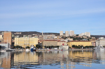 city scape of Rijeka on coast line with reflection on the adriatic sea