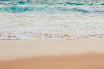 Wave foam on the beach