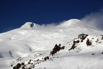 Winter landscape with snow-capped peaks of the Caucasus mountains, the highest peak in Europe-mount Elbrus, Russia