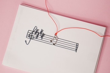 musical notes on pink background