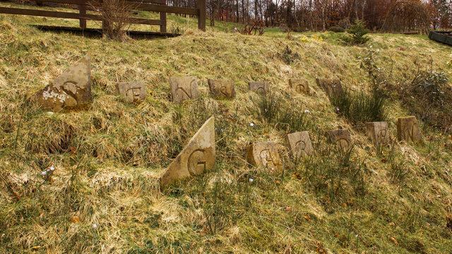 Engraved stones at  the Scents and Sensitivities Sensory Garden at Auchinstarry, near Kilsyth, Scotland.