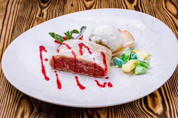 Cherry strudel with ice cream