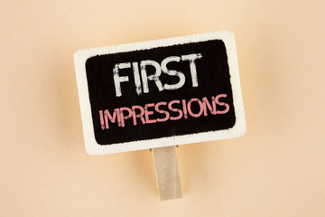 Handwriting text First Impressions. Concept meaning Encounter presentation performance job interview courtship written on Wooden Notice Board on the plain background.