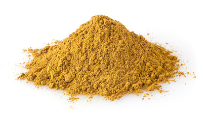 Heap of curry powder isolated on white background