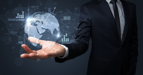 Businessman handing transparent global information flow concept on his hand