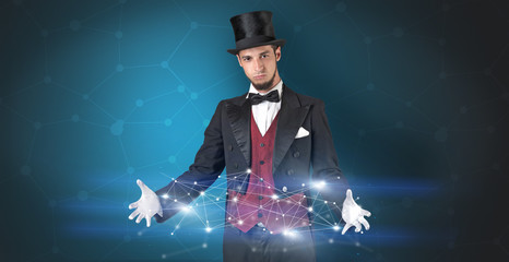 Fototapeta na wymiar Magician with blue background and geometrical connection between two hands