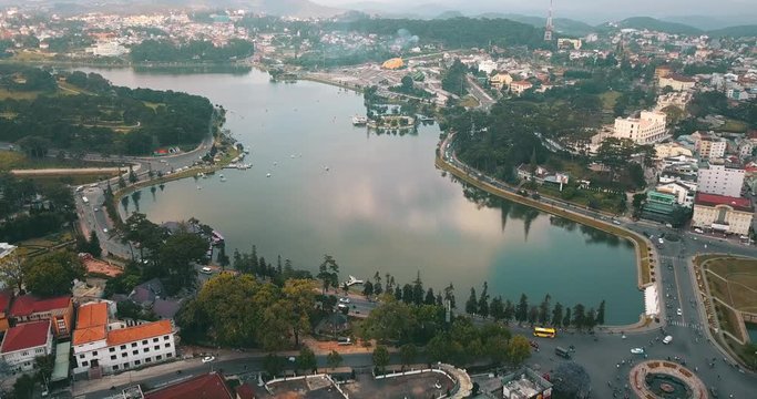 AERIAL 4K: Aerial view from the drone to Dalat city and Cam Ly Spring lake.Southern parts of the Central Highlands region of Vietnam