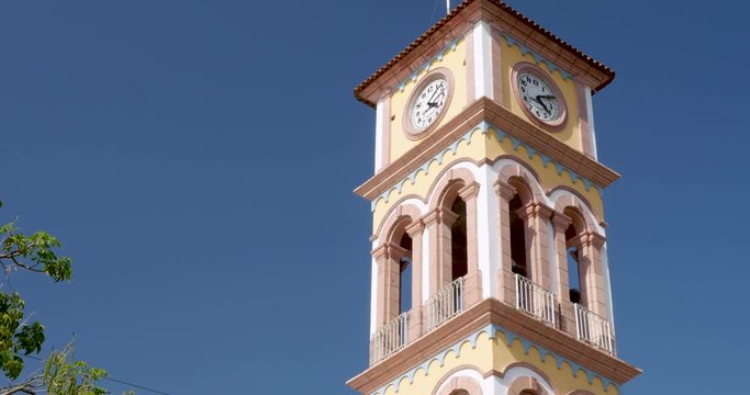 Clock tower of the Parroquia de la Santa Cruz in Puerto Vallarta, Mexico