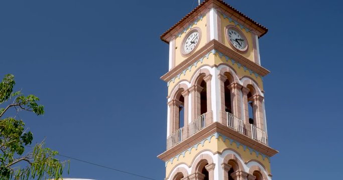 Medium shot of the clock tower in Puerto Vallarta, Mexico