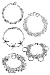 Woman bracelets. Elegant silver bracelets with charms, isolated on white background, clipping paths included