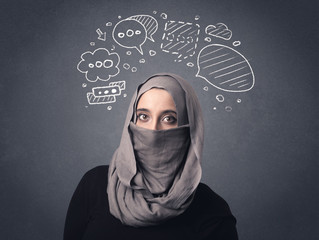 Young muslim woman wearing niqab with drawn speech bubbles above her head 