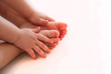 kid is two years doing exercises. Flat Feet in Children. child have flat feet. problems of children. stretching, physical therapy.