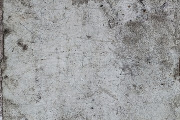 The texture of the old gray walls with cracks, scratches