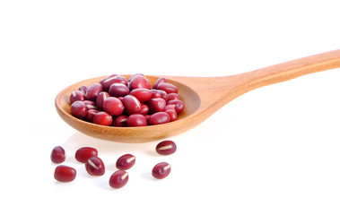 red beans in wood spoon on white background