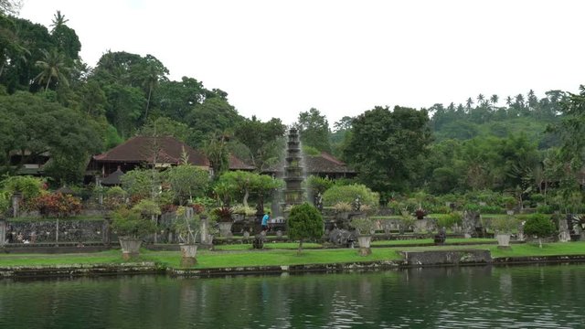 tirta ganga beautiful water palace green park in bali indonesia, fountain stream, wonderful nature landscape, place for meditation and relaxation