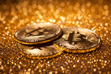 Bitcoin on a gold background