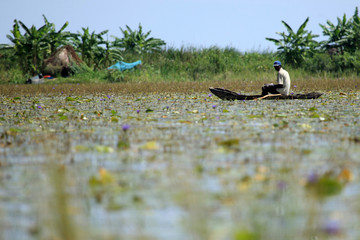 Floating Fishing Village - Uganda, Africa © Sam D'Cruz